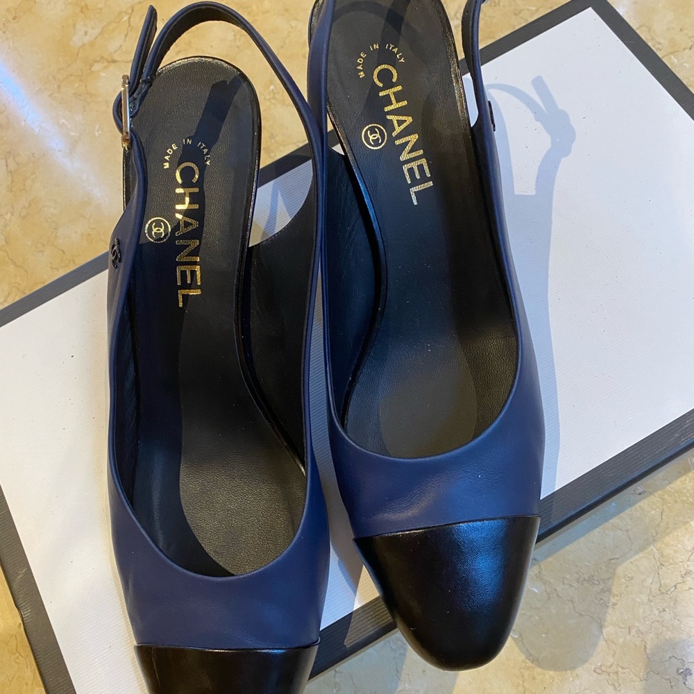 CHANEL Navy and black sling back low heel with metal heel detail in size 41.